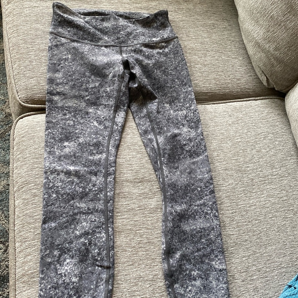 size 4 greyish and white like new